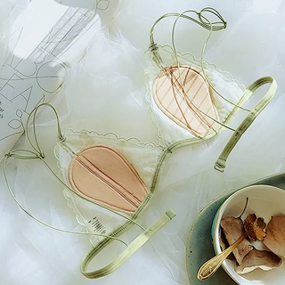Flat lay showing inside the cup of a Dragonfly lace bra